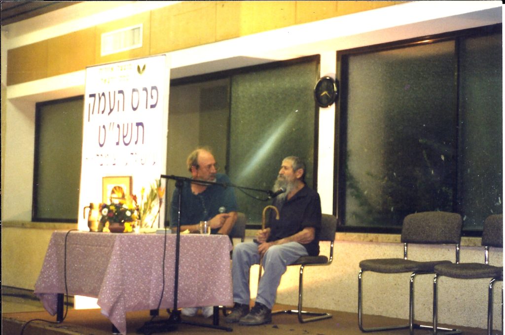 talking with elyahu amitzur, one of kfar yehoshua, while elihu recieved the emek izrael prize